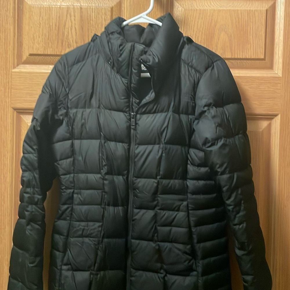 North Face small puffer long coat. It is sure to keep you warm!